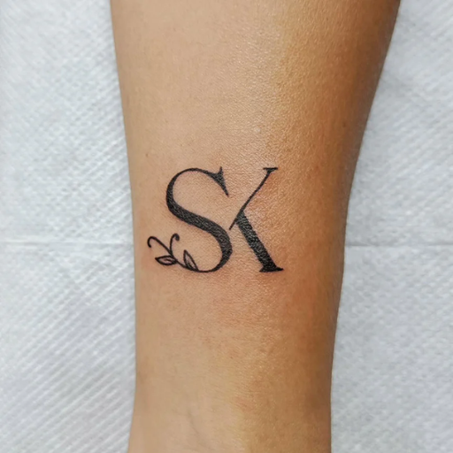 How can I personalize my S initial tattoo